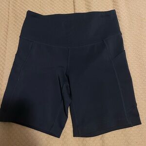 Women's New Balance Black High-Waisted Biker Shorts with Pockets